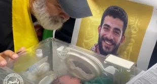 حفيد وفاء شرارة يحمل اسم جده وعيناه على صوره والده الشهيد
